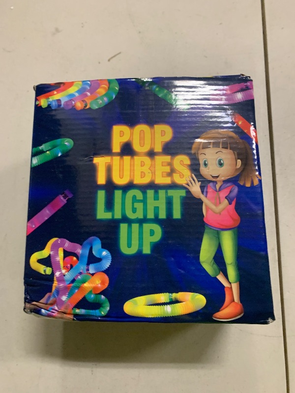 Photo 1 of 24 Pcs Halloween Glow Sticks Toys for Kids, LED Light Up Pop Tubes/Bracelet Party Favors for Kids,Glow in The Dark Party Supplies,Birthday Gifts Xmas Stocking Goodie Bags Stuffers for Boys Girls