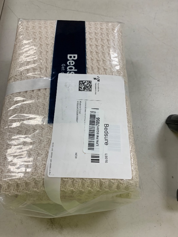 Photo 1 of Bedsure Gentlesoft 100% Cotton Large Throw Blanket for Couch 50x70 inches - Breathable and Soft, Waffle Weave Throw Blanket for Office, Khaki (a Little Bit Yellow)
