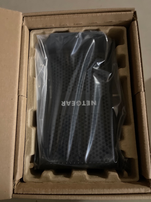 Photo 1 of NETGEAR CM1000 DOCSIS 3.1 Cable Modem - Black W/Power Supply
