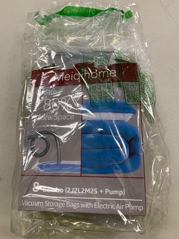 Photo 1 of Vacuum Storage Bags with Electric Air Pump 8 Combo (2 Jumbo/2 Large/2 Medium/2 Small), Plastic Packaging Bags,Travel Vacuum Bags For Luggage,Clothes, Pillows, Comforters, Blankets, Bedding
