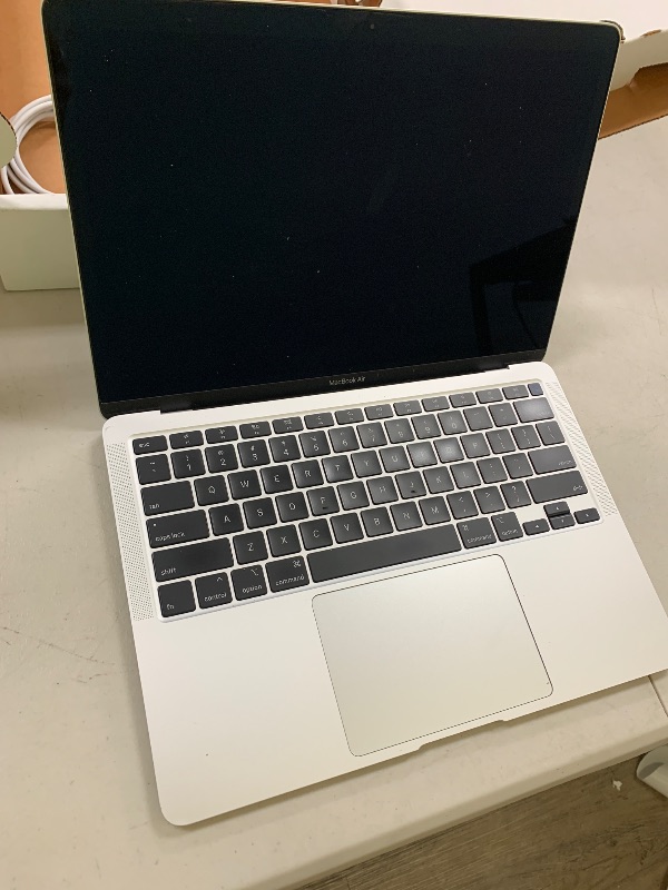 Photo 1 of Apple 2020 MacBook Air with 1.1GHz Intel Core i3, 13-inch, 8GB RAM, 128GB SSD Storage Space Gray (Renewed)