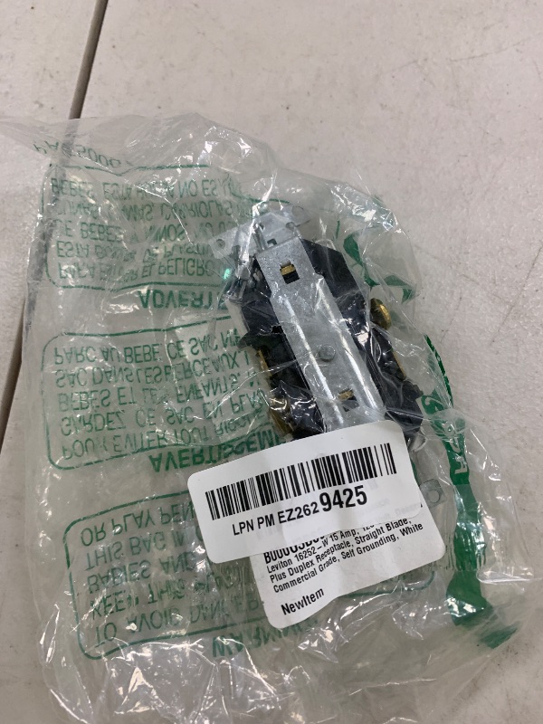 Photo 1 of Leviton 15 Amp, 125 Volt, Decora Plus Duplex Receptacle, Straight Blade, Commercial Grade, Self Grounding, 16252-W, White
