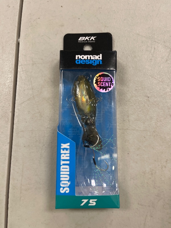 Photo 1 of Nomad Design Squidtrex Fishing Lure with Patented Technology Vibration Design - TPE Soft Plastic, BKK Assist Hooks, Squid Lure - 75 Vibe 3" - 1/2oz - Holo Ghost Shad
