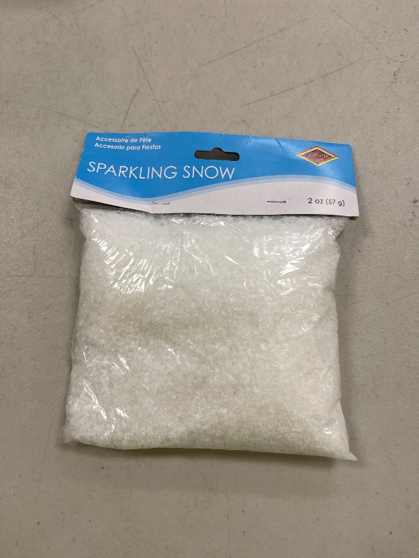 Photo 1 of Beistle Sparkling Snow, Sparkling Snow Confetti, Christmas Decorations & Holiday Plastic Snowflakes, Wintertime Snowy Iridescent Decor, 2 oz. Pkg.