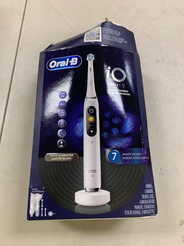 Photo 1 of Oral-B iO Series 9 Electric Toothbrush with 3 Replacement Brush Heads, White Alabaster