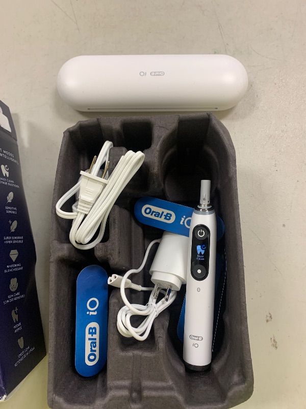 Photo 1 of Oral-B iO Series 9 Electric Toothbrush with 3 Replacement Brush Heads, White Alabaster