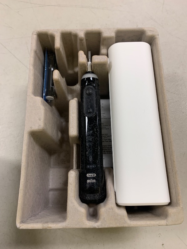 Photo 1 of Oral-B Genius X Limited Rechargeable Electric Toothbrush with 1 Replacement Brush Head, Travel Case, Midnight Black