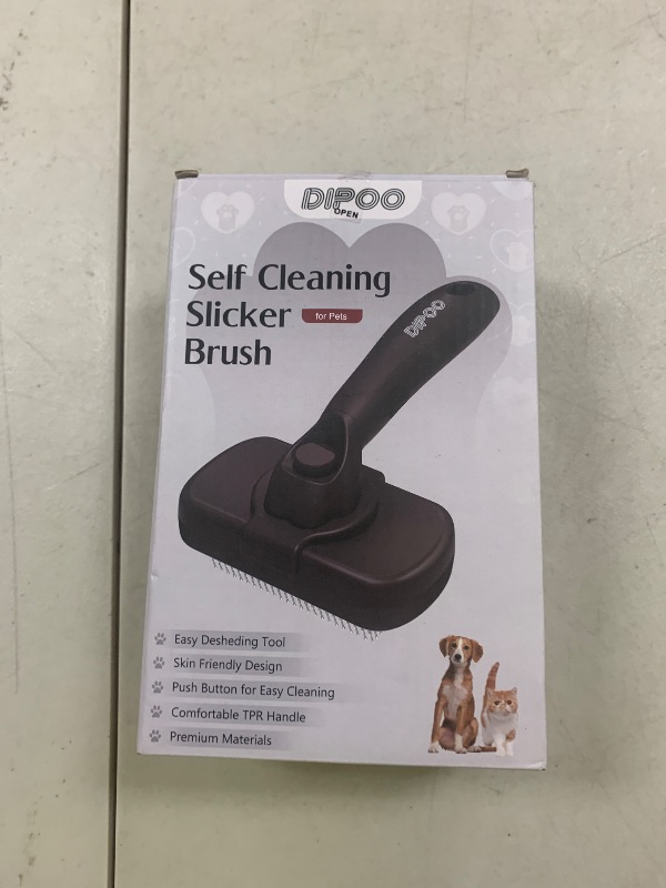 Photo 1 of Dipoo Self Cleaning Shedding Brush - Skin Friendly Grooming Tool for Dogs, Cats, and Puppies, Deshedding and Hair Removal for Long and Short Haired Pets, Black