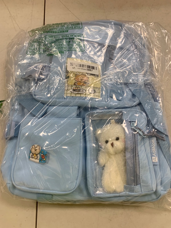 Photo 1 of AoMoon Kawaii Backpack Lovely Pastel Rucksack for Teen Girls Aesthetic Student Bookbags with Kawaii Pin and Cute Accessories (Light Blue-C)