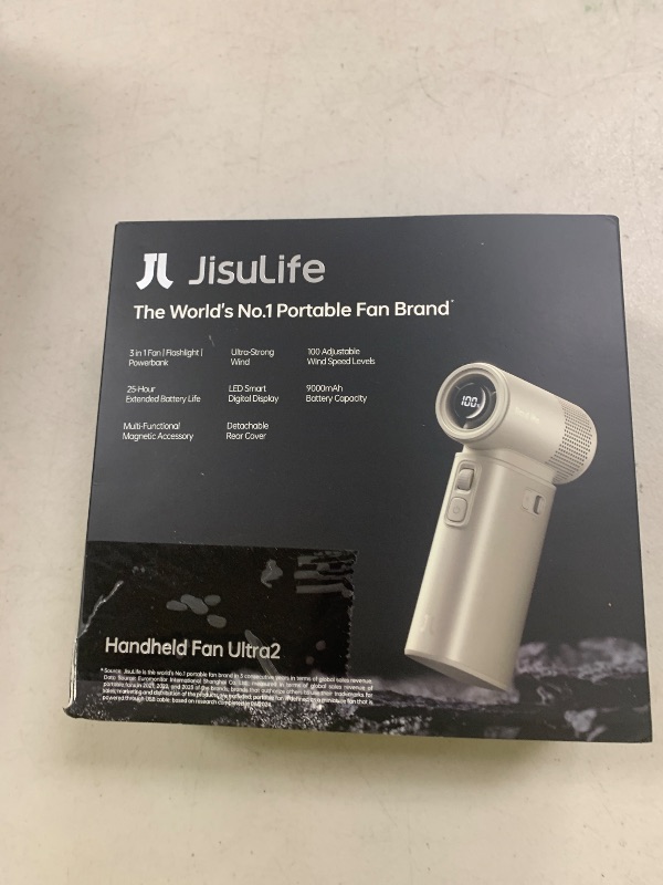 Photo 1 of JISULIFE Portable Handheld Fan Ultra2, 9000mAh Max 25 Hrs, 5 IN 1, 100 Speed Turbo Fan Rechargeable 18W Power Bank with Flashlight, Metal Shell Multi-Function Travel Essentials Gifts for Men-Brown
