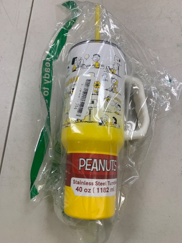 Photo 1 of Silver Buffalo Peanuts Featuring Charlie Brown, Snoopy, Woodstock, Lucy, Sally, Linus, and More Stainless Steel Tumbler with Handle and Straw, Fits in Standard Cup Holder, 40 Ounces