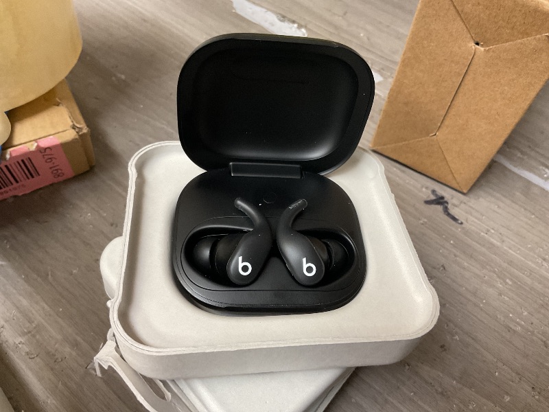 Photo 1 of Beats Powerbeats Fit - Wireless Noise Cancelling Workout Earbuds with Secure-Fit Wingtips, Up to 30-Hour Battery Life, Sweat & Water Resistant, Apple & Android Compatible - Jet Black