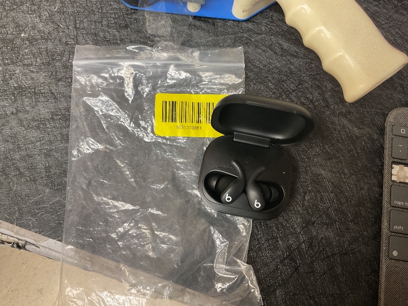 Photo 1 of Beats Powerbeats Fit - Wireless Noise Cancelling Workout Earbuds with Secure-Fit Wingtips, Up to 30-Hour Battery Life, Sweat & Water Resistant, Apple & Android Compatible - Jet Black