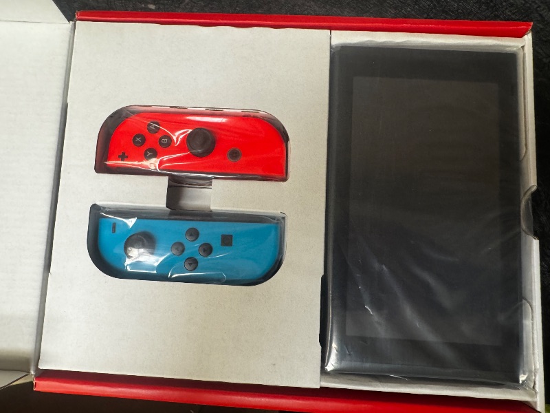 Photo 1 of Nintendo Switch Portable Game Console 15.8 Cm (6.2") 32 Gb, W128280283 (15.8 Cm (6.2) 32 Gb Touchscreen Wi-Fi Blue, Grey, Red)