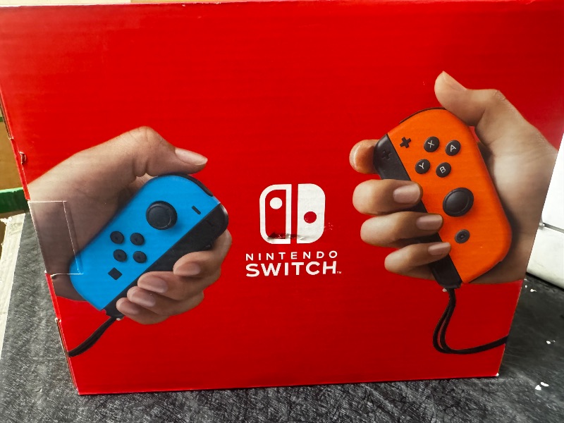 Photo 1 of Nintendo Switch Portable Game Console 15.8 Cm (6.2") 32 Gb, W128280283 (15.8 Cm (6.2) 32 Gb Touchscreen Wi-Fi Blue, Grey, Red)