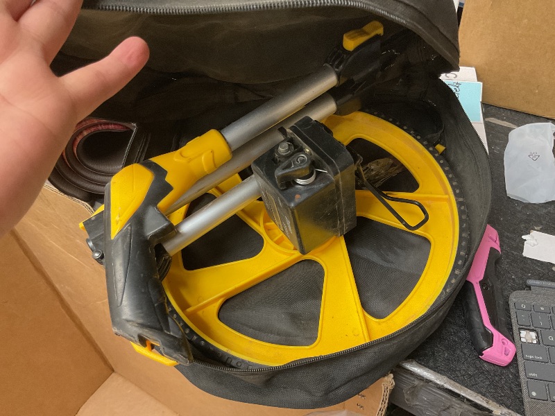 Photo 1 of Zozen Measuring Wheel in Feet and Inches, Mechanical/Double Collapsible/One Key to Reset/Kickstand to Keep Stand/Starting Point Arrow and Cloth Carrying Bag, 0-9,999 Ft Measure Wheel.