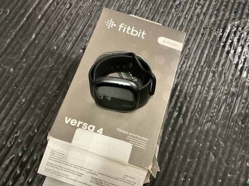 Photo 1 of Fitbit Versa 4 Fitness Smartwatch with Daily Readiness, GPS, 24/7 Heart Rate, 40+ Exercise Modes, Sleep Tracking and more, Black/Graphite, One Size (S & L Bands Included)