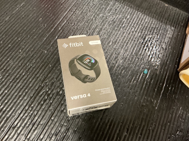 Photo 1 of Fitbit Versa 4 Fitness Smartwatch with Daily Readiness, GPS, 24/7 Heart Rate, 40+ Exercise Modes, Sleep Tracking and more, Black/Graphite, One Size (S & L Bands Included)