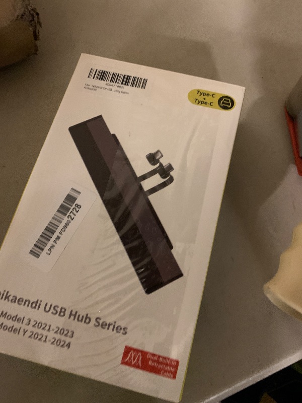 Photo 1 of Leikaendi Car USB Hub Charger for Tesla Center Console with Fast Charging Retractable Cables Phone Charger Docking Station Accessories(2 Type-C(Model Y 2021-2024 & Model 3 2021-2023))