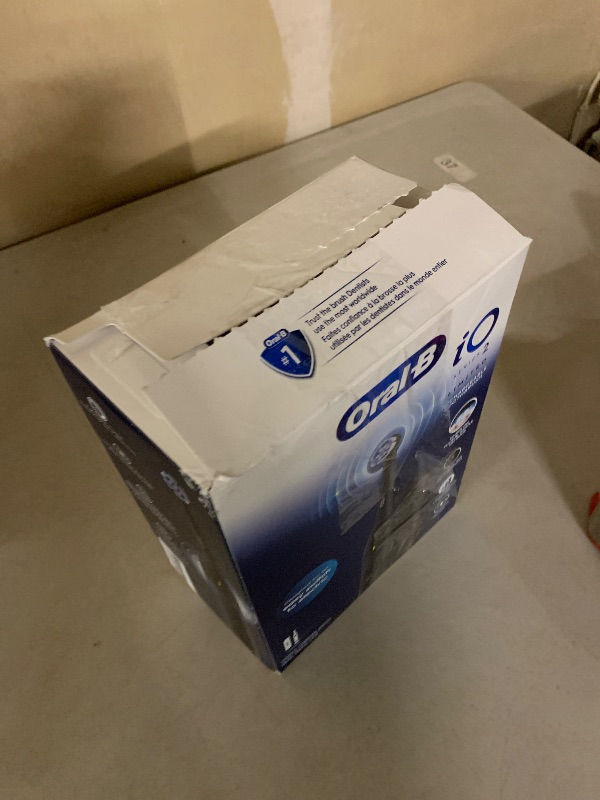 Photo 1 of Oral-B iO Simple Clean Rechargeable Electric Powered Toothbrush, Night Black with 1 Gentle Care Brush Head and 1 Black Travel Case - Automatic Pressure Sensor to Protect Gums - 3 Modes - 2 Min Timer