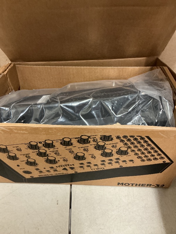 Photo 1 of MOOG Mother-32 Semi-Modular Eurorack Analog Synthesizer with 32-Step Sequencer, VC Oscillator and Ladder Filter, MIDI In, Extended Patchbay, CV Jack