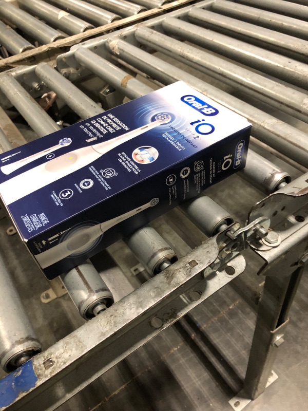 Photo 1 of *MAJOR DAMAGE*
Oral-B Rechargeable Electric Toothbrush, iO2 Starter Kit, 3 Cleaning Modes, Automatic Pressure Sensor to Protect Gums, 2 Brush Heads, Pure White