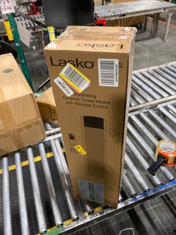 Photo 1 of ***NEW*** Lasko Oscillating Digital Ceramic Tower Heater for Large Rooms, with Adjustable Thermostat, Timer and Remote Control, 29 Inches, 1500W, Black, 5586