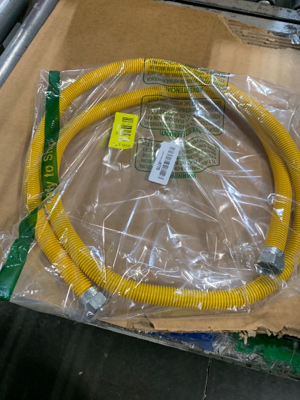 Photo 1 of ** SIMILAR** Eastman 72 Inch x 3/8 Inch OD Gas Line Connector with 3/4 Inch x 1/2 Inch MIP Fitting Ends for Natural Gas and Liquid Propane, Stainless Steel, Yellow, 20YE545072B