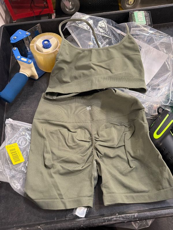 Photo 1 of **USED - MINOR DAMAGE**
SUUKSESS Women Seamless 2 piece Workout Sets Strappy Padded Sports Bra Booty High Waisted Shorts Outfits (Army Green,M)