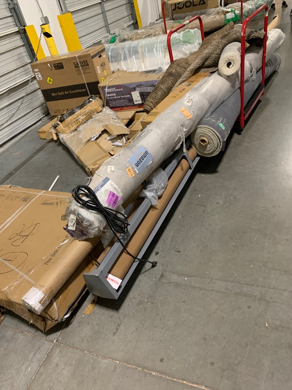 Photo 1 of ***Multiple Items*** ***Pick Up With Truck*** Pallet Of Rugs + Awning