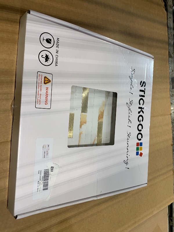 Photo 1 of *** PACK OF 4 *** STICKGOO 20 Sheets Peel and Stick Backsplash Tile, Stick on Backsplash for Kitchen and Bathroom, Calacatta Gold Marble Look PVC Mixed Gold Self Adhesive Wall Tiles