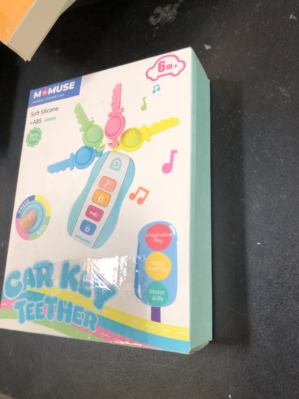 Photo 1 of MOMUSE Baby Teething Relief Toys for 6-12 Months, Baby Teether Keys Car Musical Toy for 6 9 12 18 36 Months, Food Grade Silicone Sensory Chew Toy Travel Toys Gifts for Infant Baby Boys & Girls