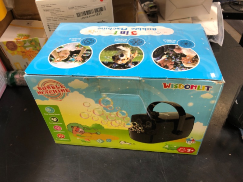Photo 1 of Bubble Machine, 3 in 1 Bubble Maker, Bubble Blower with Replaceable Bubble Wands, 8000+ Colorful Bubbles Per Minute, Operated by Plug-in or Batteries, Bubble Toys for Indoor Outdoor Birthday Party