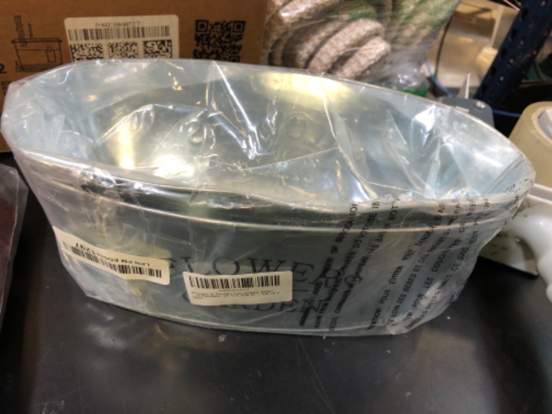 Photo 1 of Flowers & Garden Galvanized Metal Oval-Shaped Planters, 10.5x5.5x4 in. - Set of 2