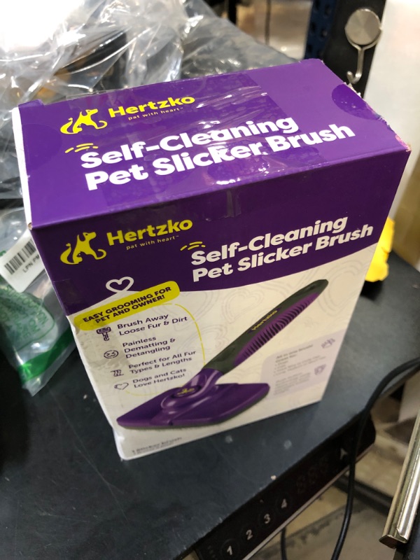 Photo 1 of Hertzko Self Cleaning Slicker Brush for Dogs and Cats - Pet Hair Brush for Shedding Long and Short Hair - Easy Clean Retractable Bristles - Cat and Dog Grooming Tool - Purple