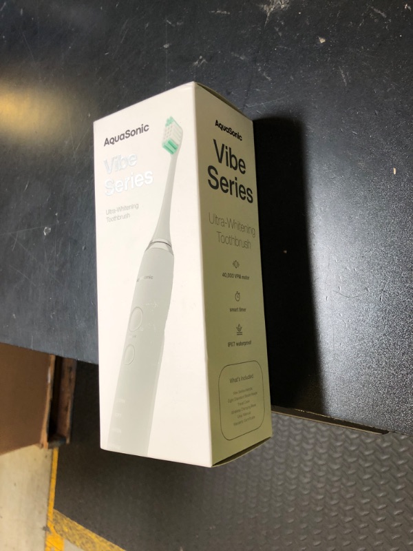 Photo 1 of Aquasonic Vibe Series Ultra-Whitening Toothbrush – ADA Accepted Electric Toothbrush - 8 Brush Heads & Travel Case – 40,000 VPM Motor & Wireless Charging - 4 Modes w Smart Timer – Optic White