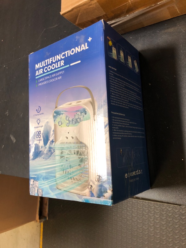 Photo 1 of IWENNUAN Portable Air Conditioners, 4 in 1 Portable AC Unit with Remote, 1500ml Water Tank, 3 Speeds, 6H Timer, 2 Spray Mist, 7 Night Light, Personal Mini Air Conditioner for Bedroom, Office, Home