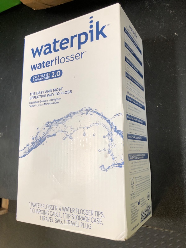 Photo 1 of Waterpik Cordless Advanced 2.0 Water Flosser For Teeth, Gums, Braces, Dental Care With Travel Bag and 4 Tips, ADA Accepted, Rechargeable, Portable, and Waterproof, Gray WP-587, Packaging May Vary