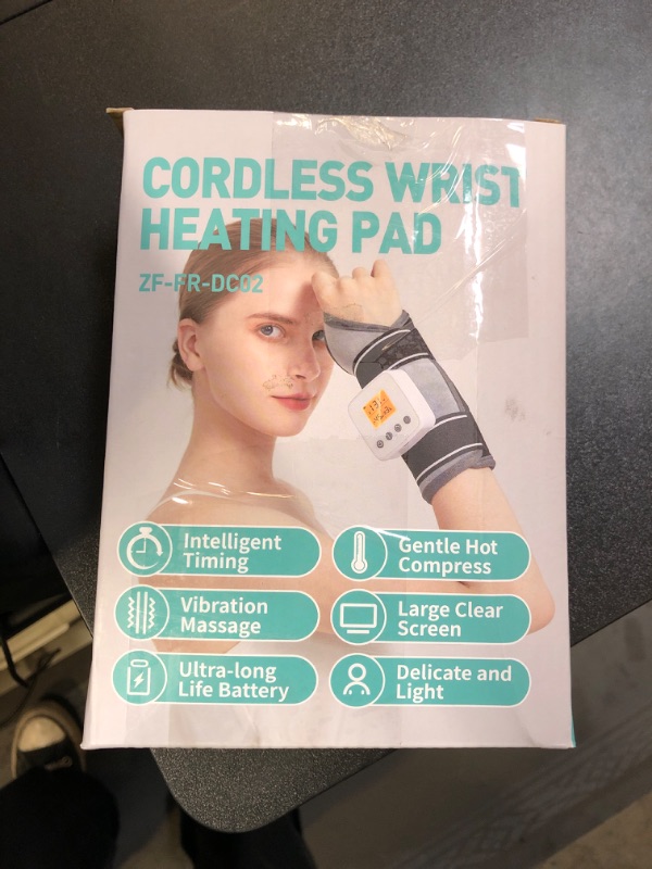 Photo 1 of AOBOCO Cordless Wrist Massager with Heat - 3000mAh Wrist Heating Pad for Carpal Tunnel Relief - Rechargeable Heated Wrist Brace Wrap for Men Women, 3 Heat Levels & 3 Vibration Mode