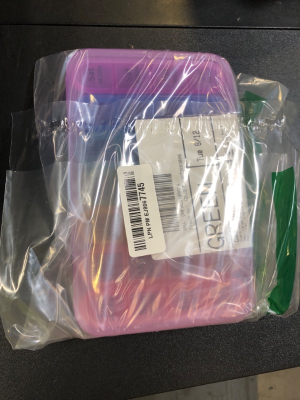 Photo 1 of Odaro Weekly Pill Organizer 4 Times a Day, Daily Pill Box 7 Day, Large Travel Pill Case with 28 Compartment to Hold Medicine, Vitamin and Supplement - Purple Case
