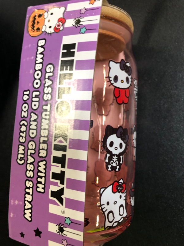 Photo 1 of Silver Buffalo Sanrio Hello Kitty and Friends Halloween Spooky Costumes Ghost Witch Vampire Zombie Frankenstein Skeleton Pink Glass Jar Tumbler with Bamboo Lid and Glass Straw, 16 Ounces