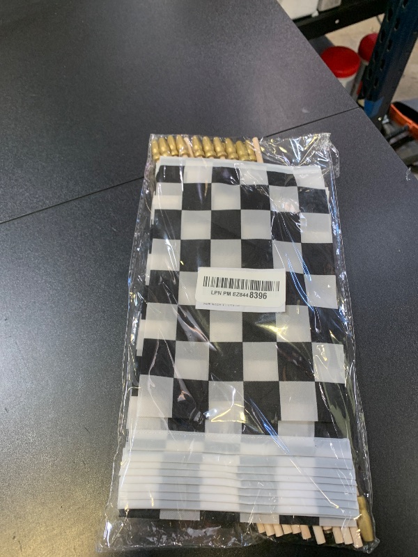 Photo 1 of LUSEOAN 20 Pack Checkered Black and White Racing Mini Stick Flags Small Miniature Handheld Race Car Flag Decorations,5x8 Inch