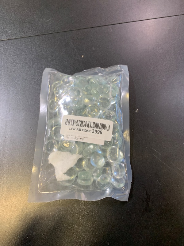 Photo 1 of FANTIAN 1lb Clear Glass Beads for Vases, 100 Pcs Glass Pebbles, Clear Flat Glass Marbles for Vase Filler Flower Candle Crafts Centerpieces and Wedding Decoration