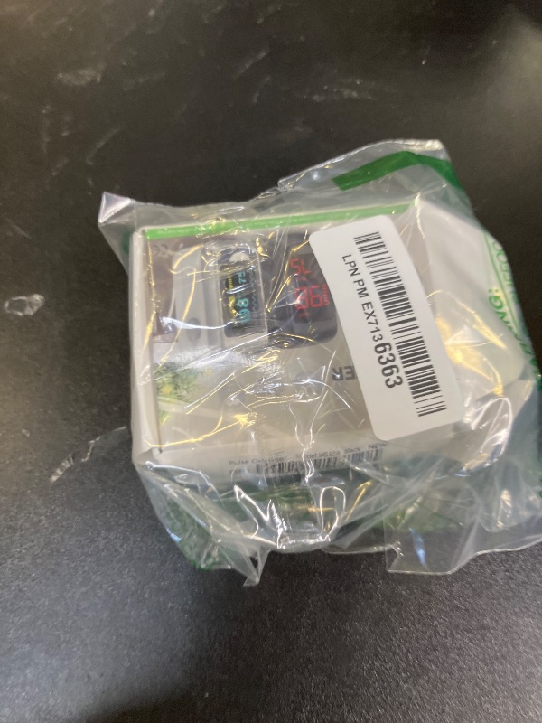 Photo 1 of Fingertip Pulse Oximeter Blood Oxygen Monitor Pulse Ox, Heart Rate and Fast Spo2 Reading Oxygen Meter with OLED Screen Included Batteries and Lanyard