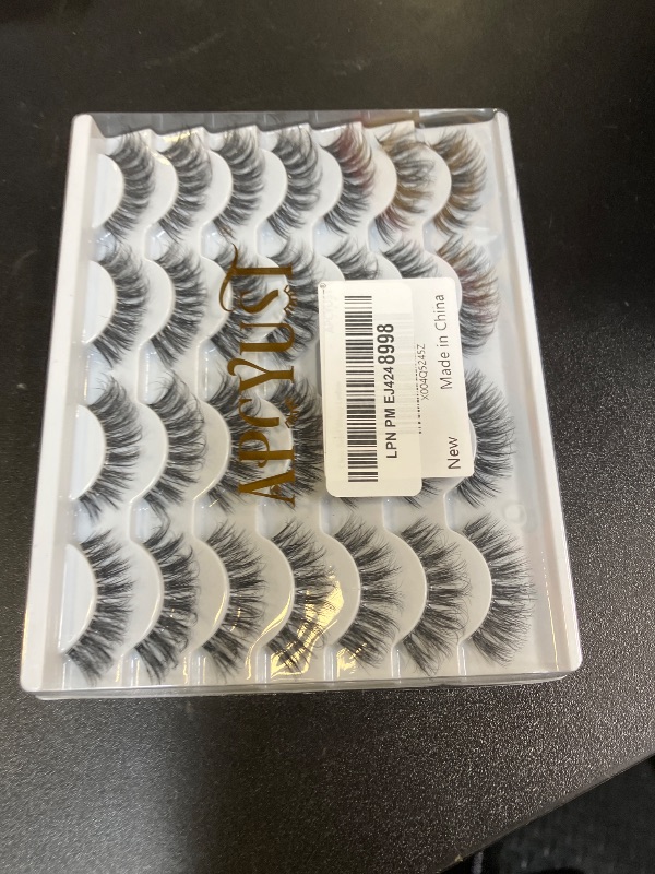 Photo 1 of APCYUST Lashes False Eyelashes Natural Wispy Lash Strips Clear Band Fake Eyelash Pack 14 Pairs Cat Eye Strip Lashes Set Fluffy Mink Eyelashes Natural Look Short Wispies Pestañas Postizas for Women