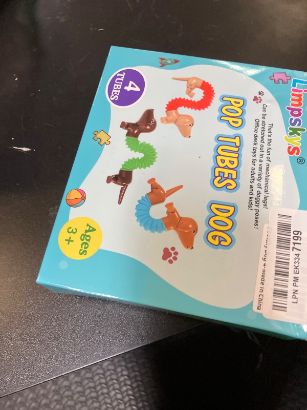 Photo 1 of Limpskys Dog pop Tubes fidgets, Travel Toys for Toddlers 3-5, Sensory Toys for Kids 5-7, fidgets for Kids, Animal pop Tubes, Easter Egg fillers,Easter Basket Stuffers?4 Pack Dog?