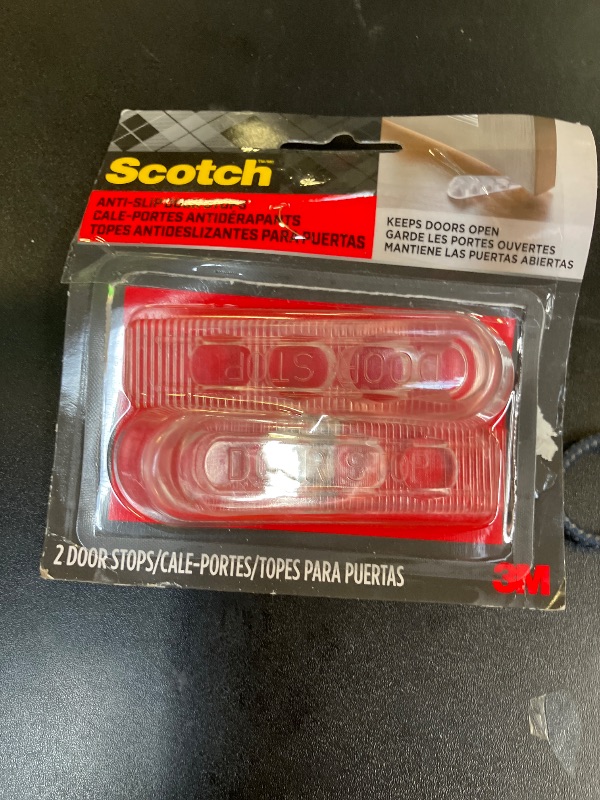 Photo 1 of Scotch Door Stoppers, 2 Count, 1-1/8 in., Flexible Material Assures Snug Fit Under Doors, Easy to Use Stops for Bottom of Door (SP947)