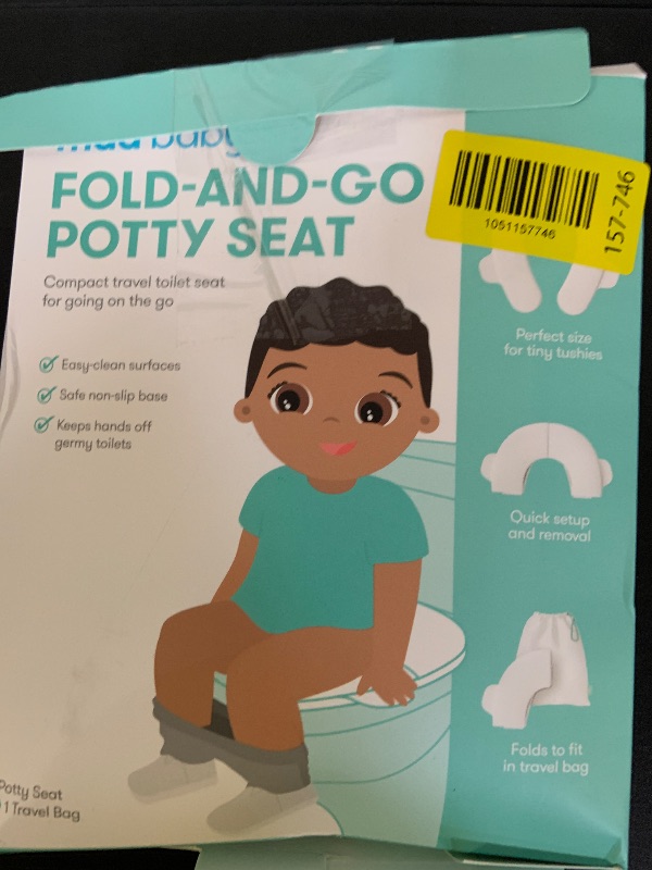Photo 1 of Frida Baby Fold-and-Go Portable Potty Seat for Toilet, Foldable Travel Potty Seat for Toddler, Fits Round & Oval Toilets, Non-Slip Base, Handles, Includes Free Travel Bag