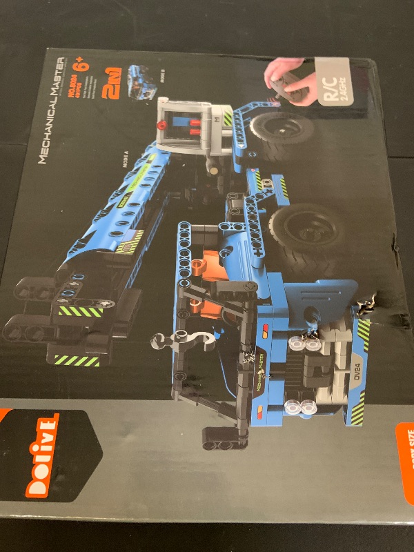 Photo 1 of DOLIVE Remote Control Building Toys, 2-in-1 Technic Vehicle Building Kits for Boys Age 8-12, Construction Erector Set Crane Truck Build Model for Boys Girls