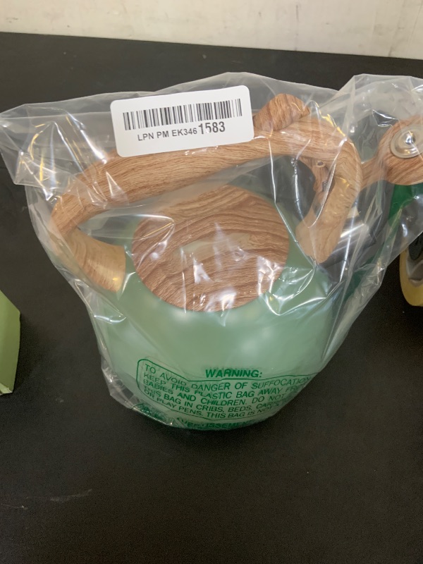 Photo 1 of Poliviar Tea Kettle, 2.7 Quart Seaweed Green Finish with Wood Pattern Handle Loud Whistle Food Grade Stainless Steel Teapot, Anti-Hot Handle and Anti-Rust, Suitable for All Heat Sources (JX2020-SB30)